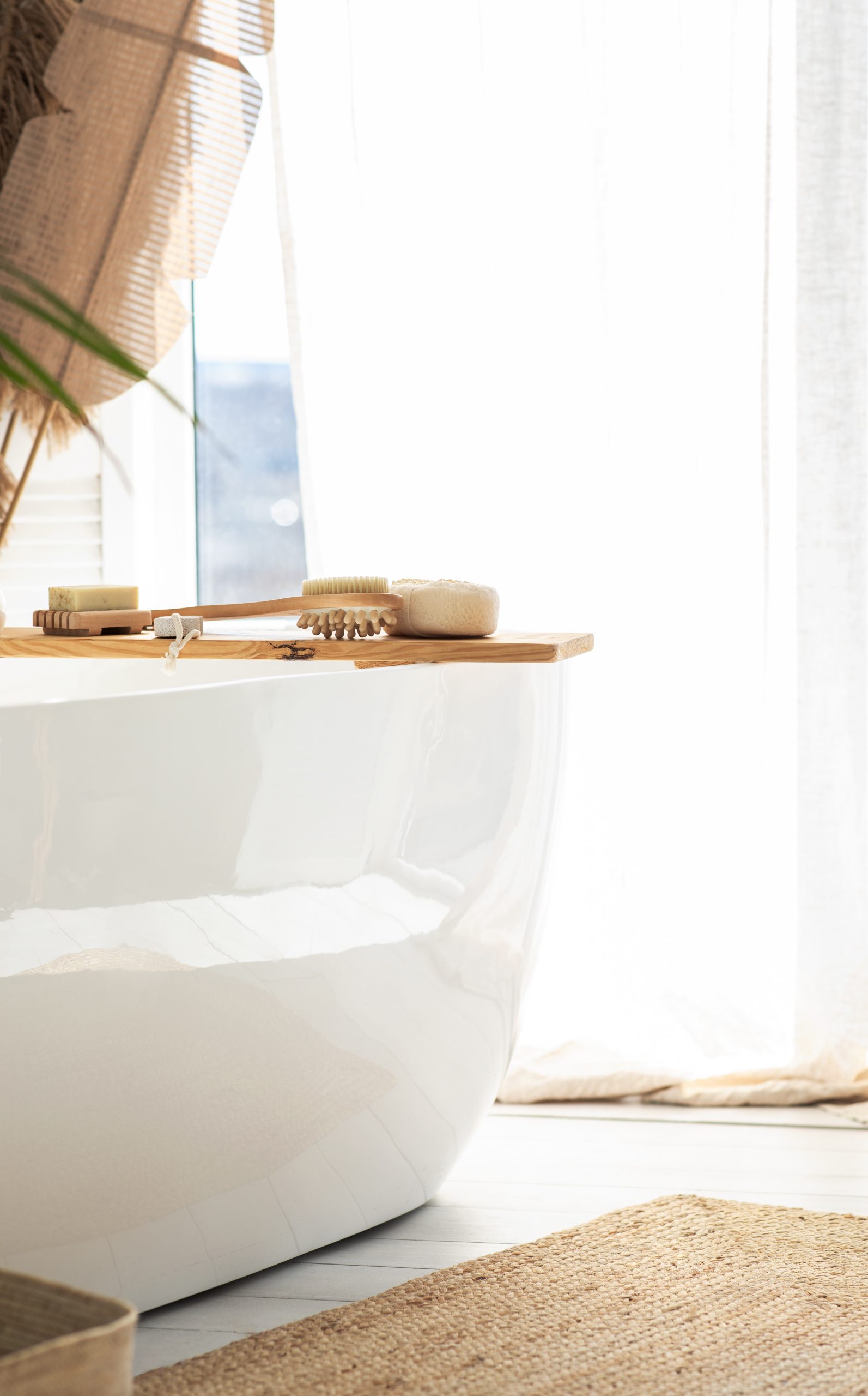 spa day at home with a white bathtub, body and skin care